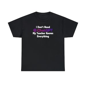 May include Black t shirt with white text that rea